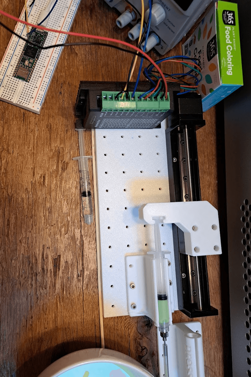 Photo of the custom-built syringe pump